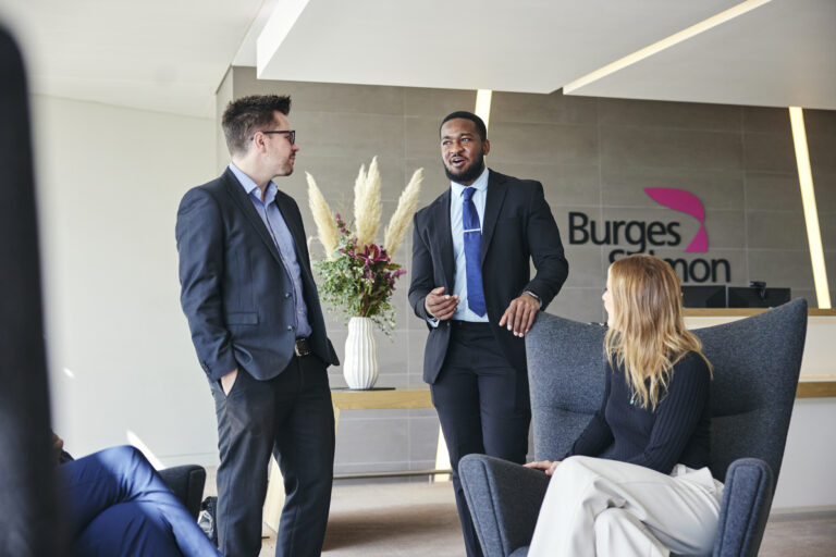 people having a conversation in office reception