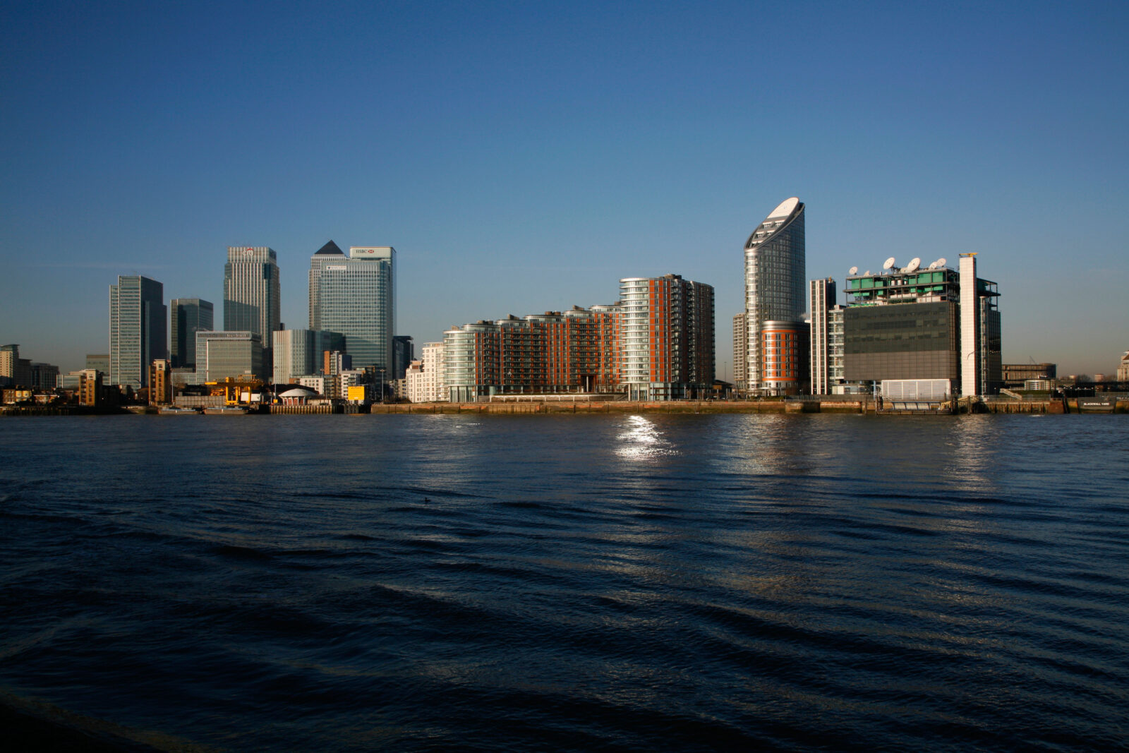 View across the River Thames to New Providence Wharf including Ontario Tower in Leamouth and Canary Wharf London