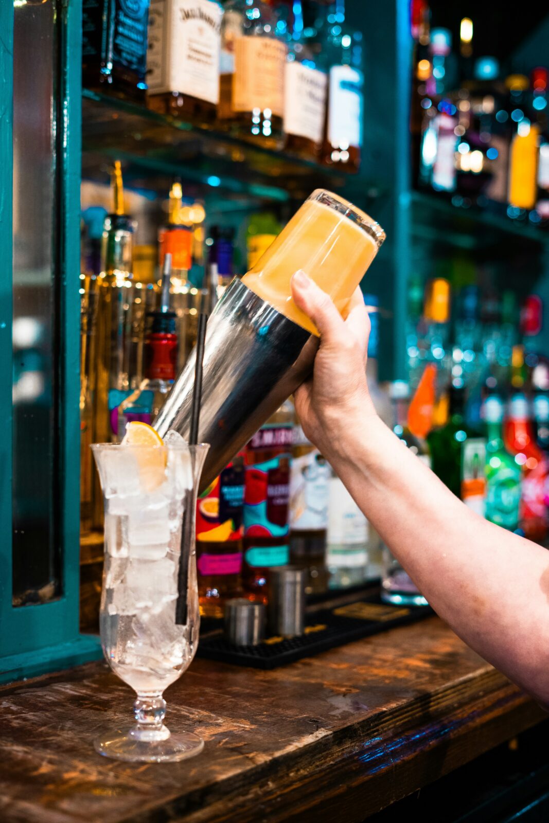 cocktail being made on bar