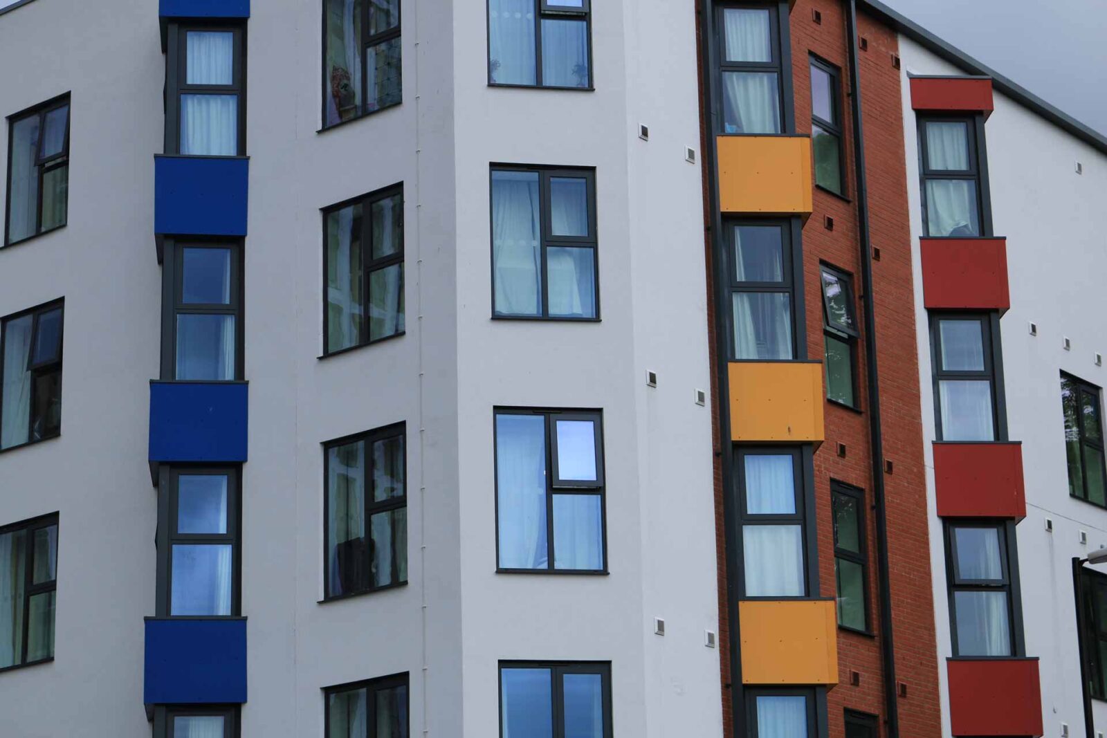 Close up of coloured window panels from student accommodation in England