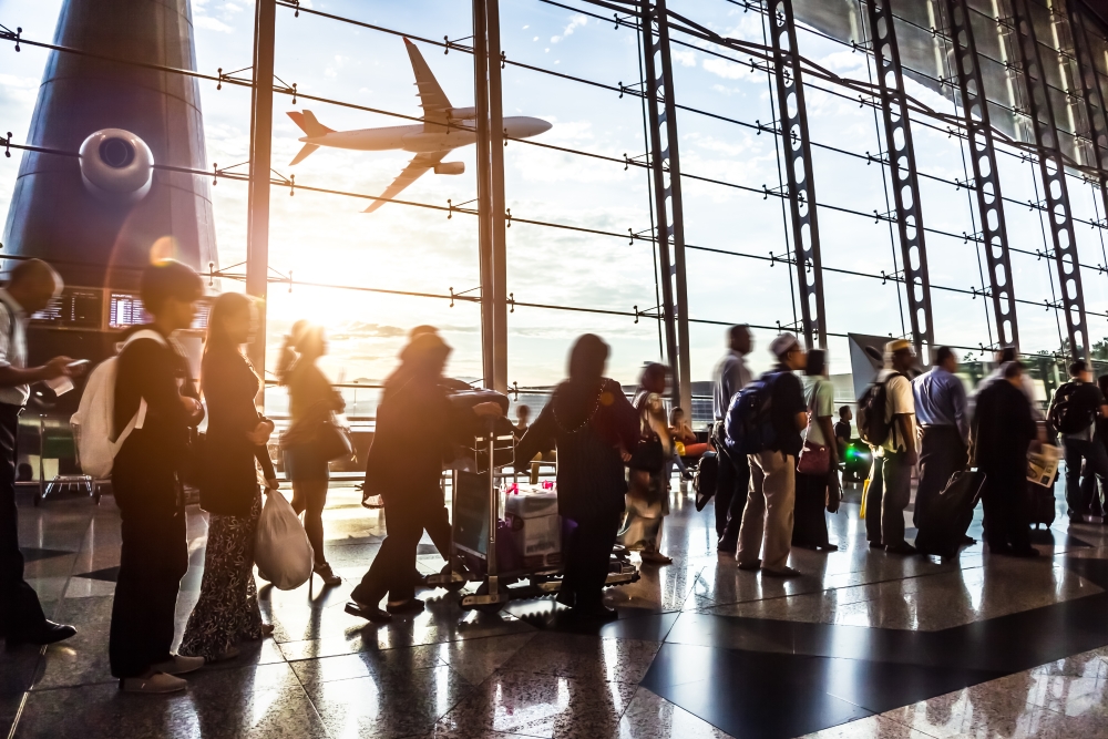 Moving queue of passengers at airport