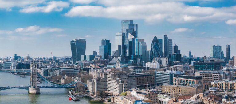 Aerial view image of London skyline with Tower Bridge and modern skyscrapers